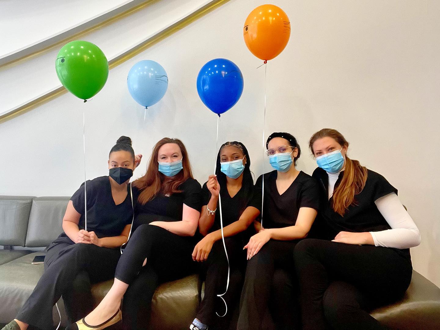 women with balloons